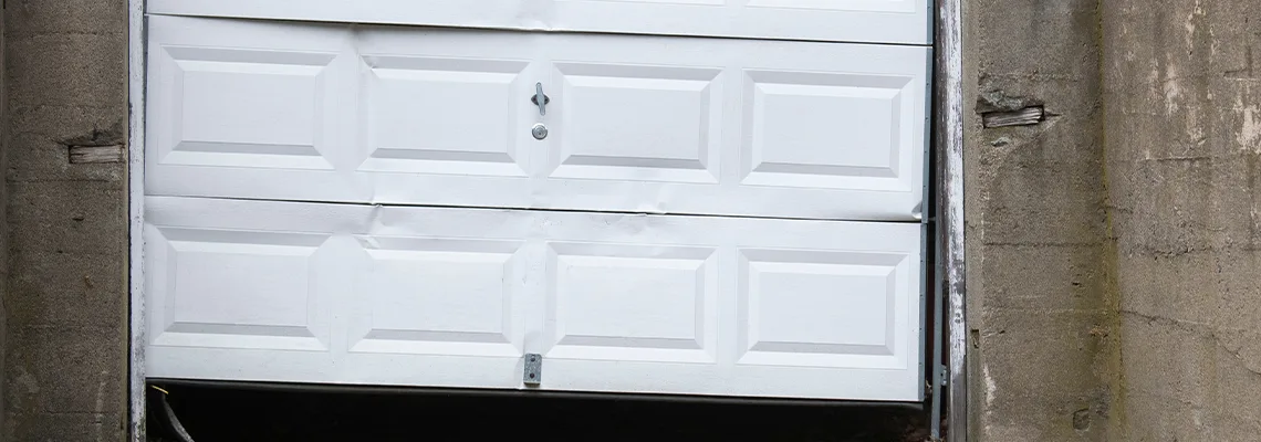 Garage Door Got Hit By A Car Dent Removal in Boca Raton, FL